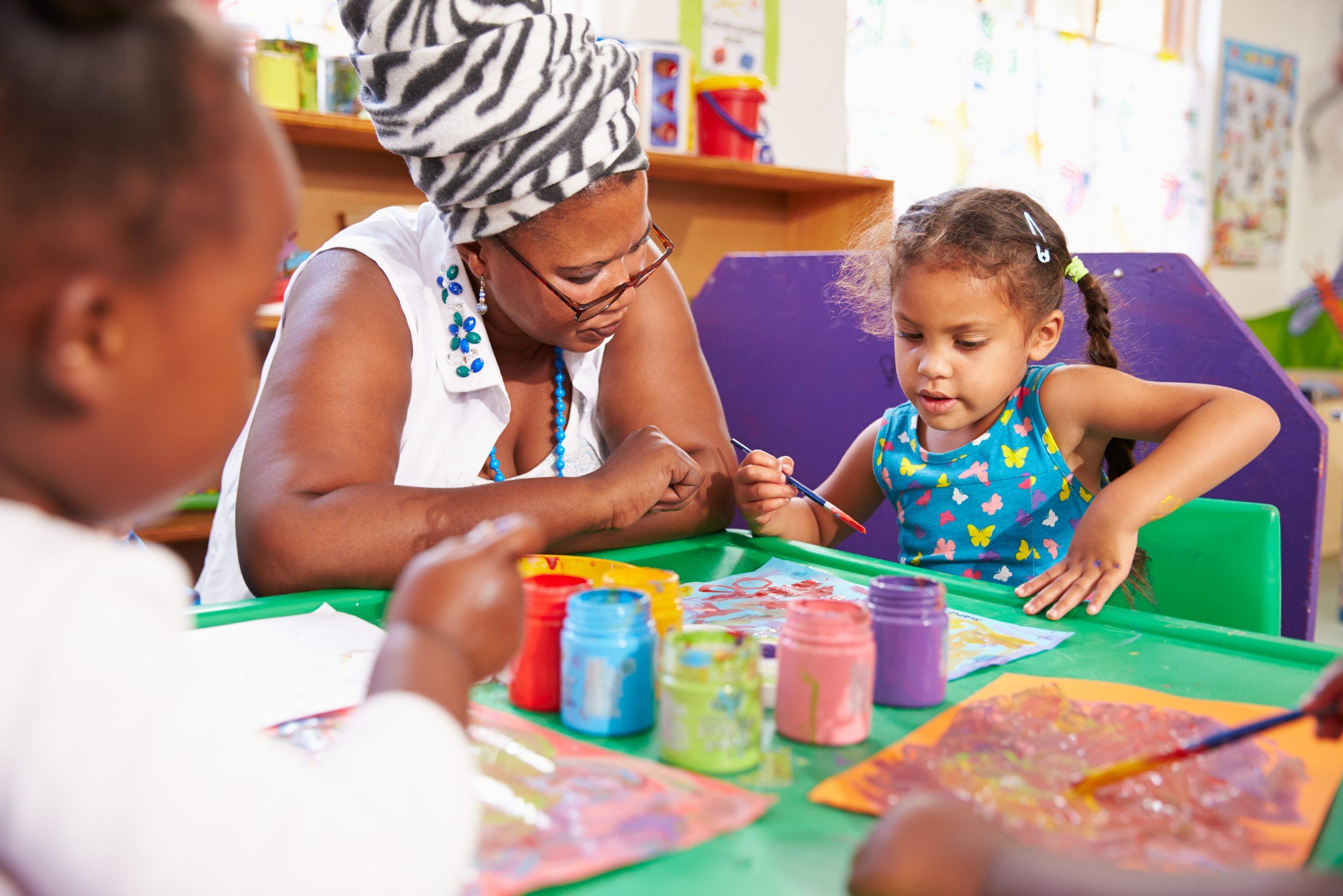 Teacher reading to children